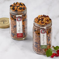 Open jars of cherry almond and grain free cherry nut energy granolas