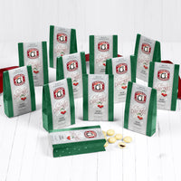 Twelve boxes of tart cherries covered in white chocolate which we affectionately call snow cherries.