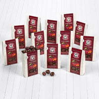 One open and eleven closed boxes of our bestselling classic dark chocolate cherries