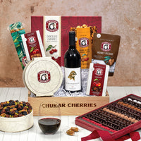 Gift pictured with columbia valley red blend, grand assortment, triple cherry nut tin, milk chocolate honey pecans, cherry caramel twists, cherry pecan caramel corn, black forest cherries, and cherry trio 
