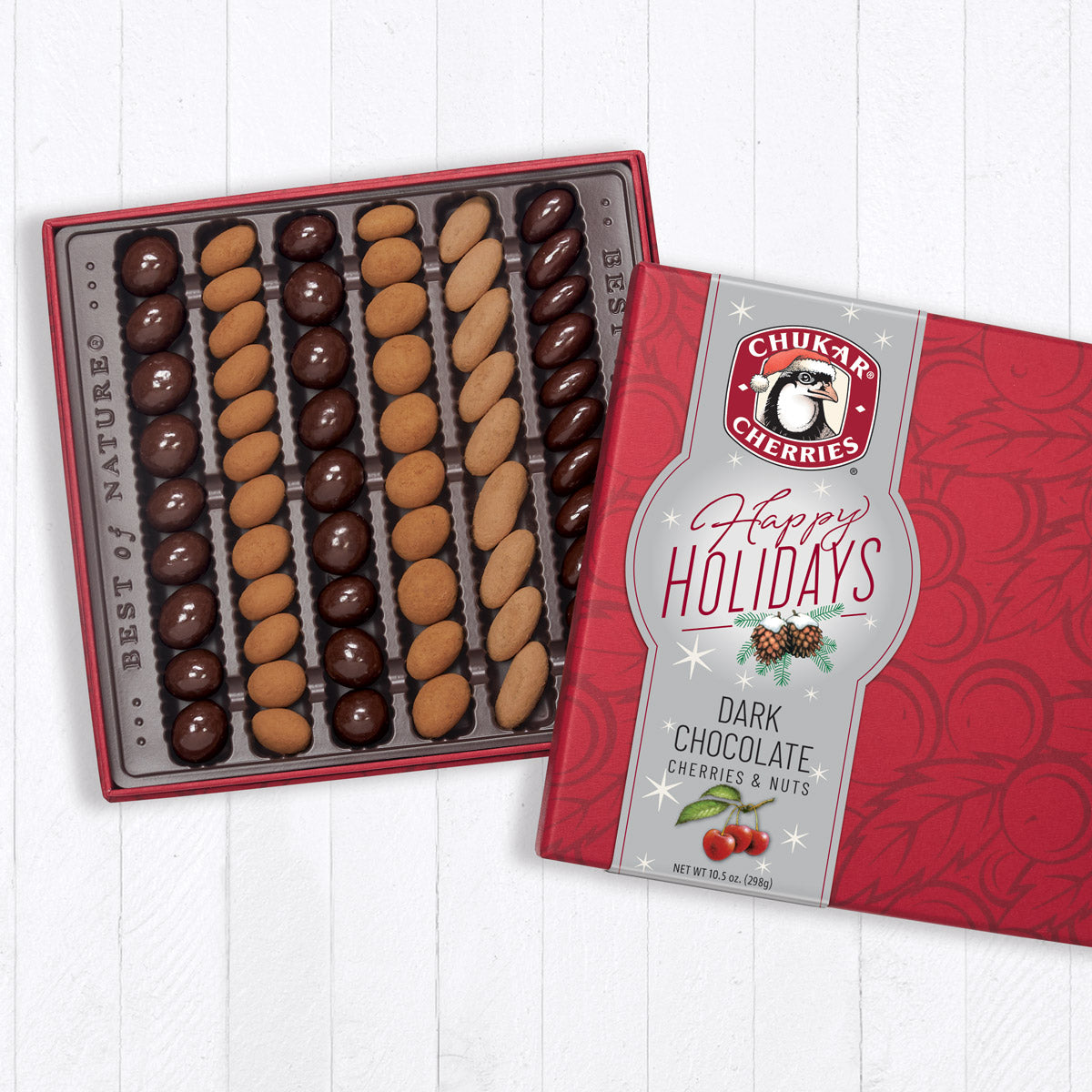 Six row dark happy holidays chocolate original assortment filled with dark and ultra chocolate covered cherries and nuts