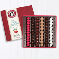 Six row happy birthday original assortment filled with chocolate covered cherries, nuts, and berries
