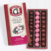 Box of Chukar Cherries milk and dark chocolate cherries on a white background