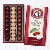 Three row milk chocolate cherry classic assortment filled with cherry bings, truffle cherries, and classic milk cherries. 