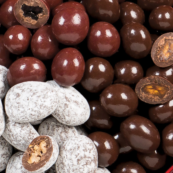 Close up of holiday chocolate cherry and pecan gift tin