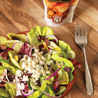 Blue cheese salad topped with rainier cherries