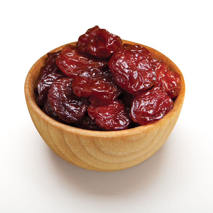 Dried whole organic Tart cherries up close  
