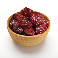 Dried whole organic Tart cherries up close  