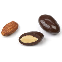 Almond and cross-section of chocolate covered dry roasted almond