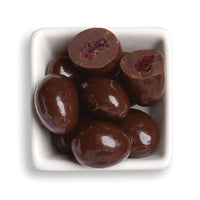 Whole and cut cabernet cherries in bowl
