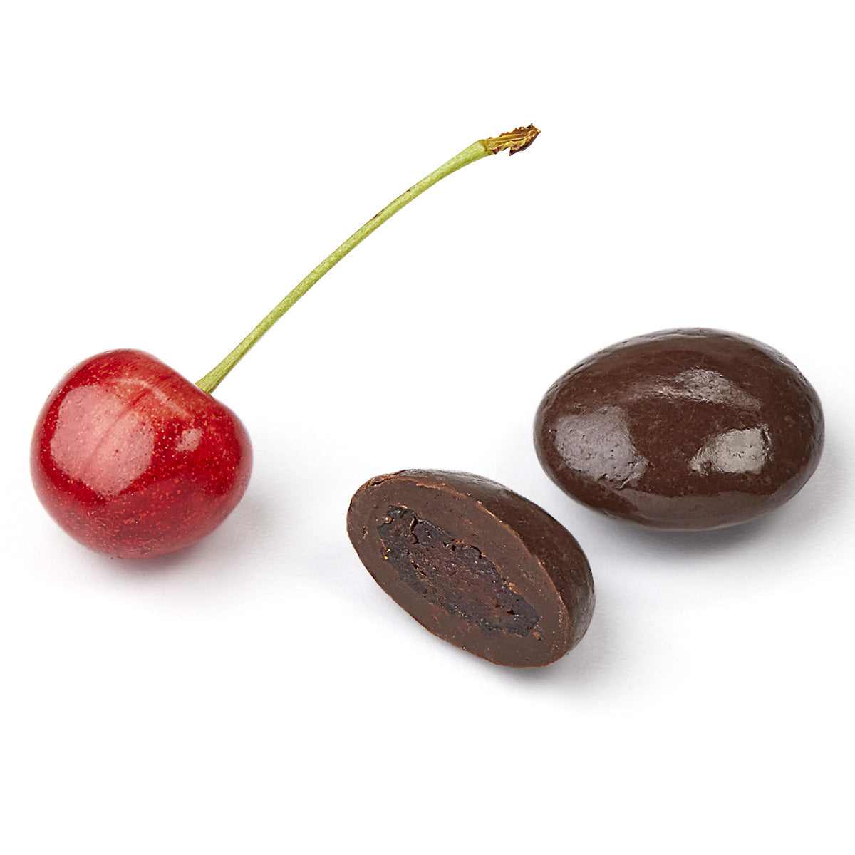 Fresh cherry and cross-section of chocolate covered dried cherry