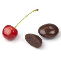 Fresh cherry and cross-section of chocolate covered dried cherry