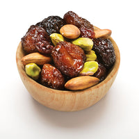 Triple cherry nut fruit and nut mix in wood bowl