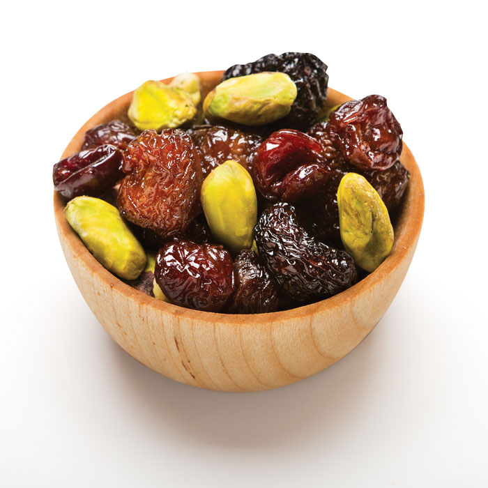 Pistachio cherry in wood bowl