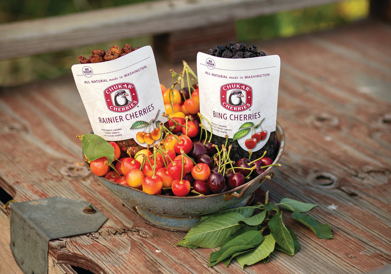 Fresh and dried cherries in a bowl