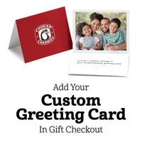 Greeting card with image of family of four close-up with kids sitting in front of parents