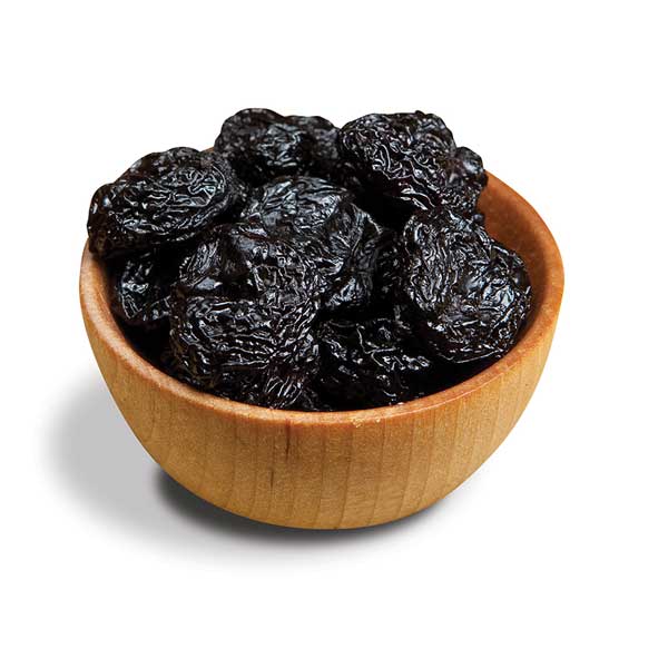 Dried bing cherries in wood bowl