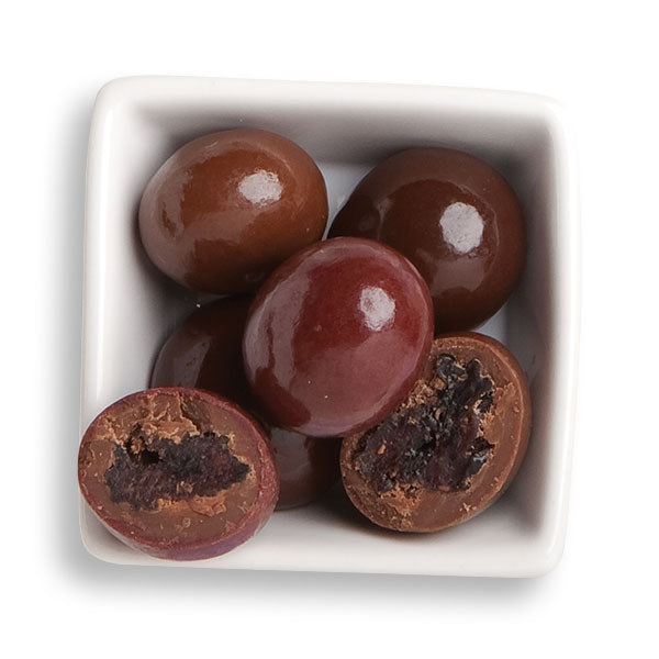 Cut chocolate cherry quartet in white bowl