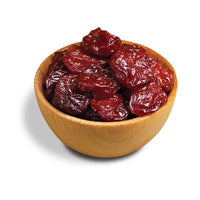 Dried tart cherries in wood bowl